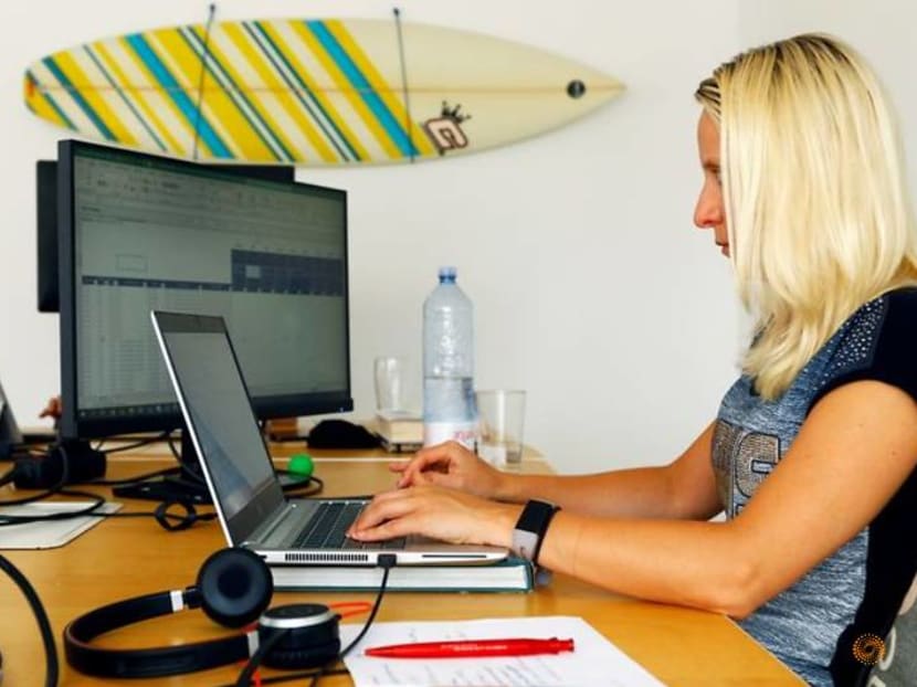 Sun-seekers enjoy European summer 'workcation' before office return Sun-seekers enjoy European summer 'workcation' before office return