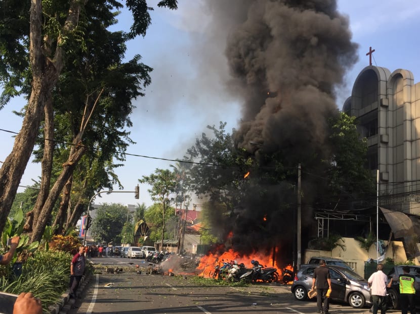Photo of the day: Motorcycles burning following a blast at the Pentecost Church Central Surabaya, in Surabaya, East Java, Indonesia on Sunday (May 13).