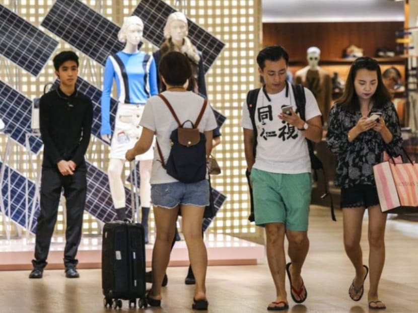 Shoppers exiting Louis Vuitton at Times Square in Causeway Bay, Hong Kong. Many consumers choose to make their purchases while travelling overseas. Shoppers exiting Louis Vuitton at Times Square in Causeway Bay, Hong Kong. Many consumers choose to make their purchases while travelling overseas.
