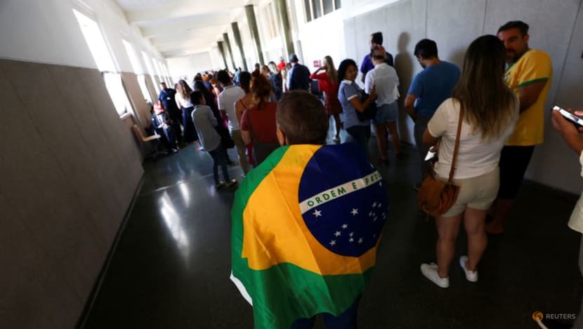 Tensions high as Brazilians on other side of Atlantic cast ballots Tensions high as Brazilians on other side of Atlantic cast ballots