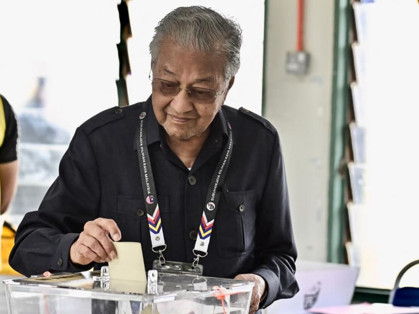Former Malaysia prime minister Mahathir Mohamad casting his vote at a polling station during the general election in Kuala Kedah district, Malaysia's Kedah state. Former Malaysia prime minister Mahathir Mohamad casting his vote at a polling station during the general election in Kuala Kedah district, Malaysia's Kedah state.