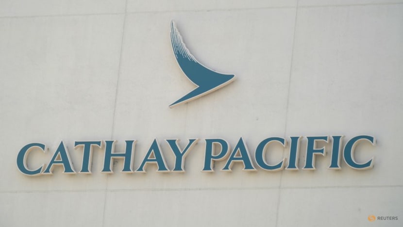 Cathay Pacific's loss shrinks in first half, risks to overseas slots flagged Cathay Pacific's loss shrinks in first half, risks to overseas slots flagged