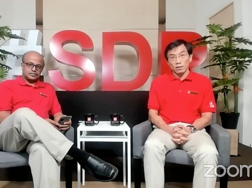 Singapore Democratic Party chairman Paul Tambyah (left) and its secretary-general Chee Soon Juan (right) hosting an online meet-the-press session on June 24, 2020.