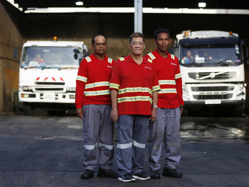 From left to right, Mr Amran Chedaud, Mr Tan Beng Hoe and Mr Jumahat Yusuf. The team is in charge of collecting recyclables daily from the homes in Clementi. Photo: Raj Nadarajan/TODAY From left to right, Mr Amran Chedaud, Mr Tan Beng Hoe and Mr Jumahat Yusuf. The team is in charge of collecting recyclables daily from the homes in Clementi. Photo: Raj Nadarajan/TODAY