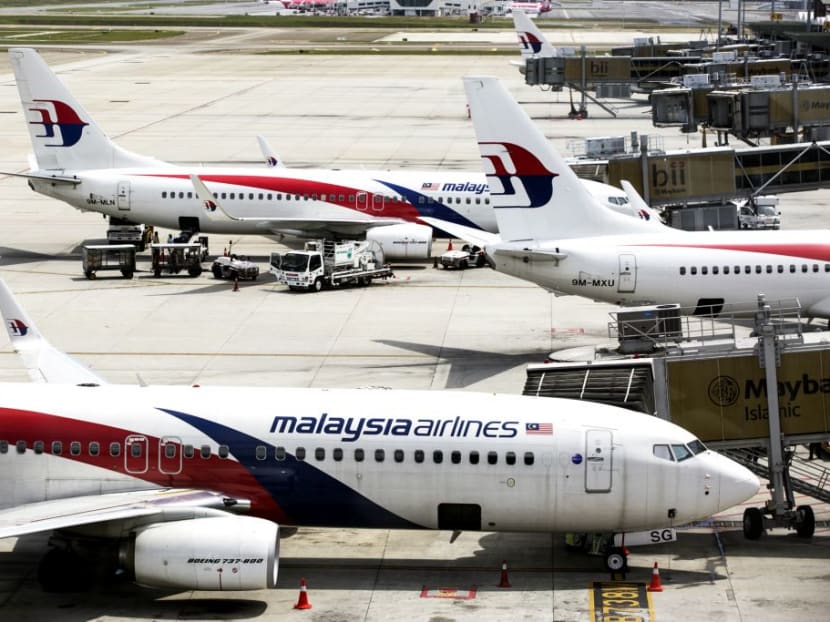 Aircraft operated by Malaysian Airlines stand on the tarmac at Kuala Lumpur International Airport (KLIA) in Sepang, Malaysia. Bloomberg file photo
