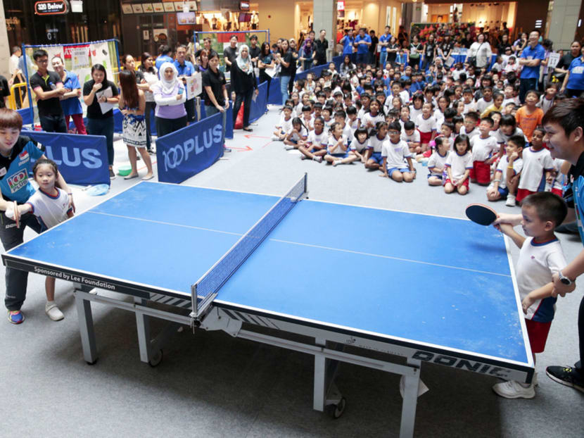 SEA Games 2015 bronze medallist (mixed doubles) Li Hu and Zhou Yihan at the Table Tennis Carnival 2015.