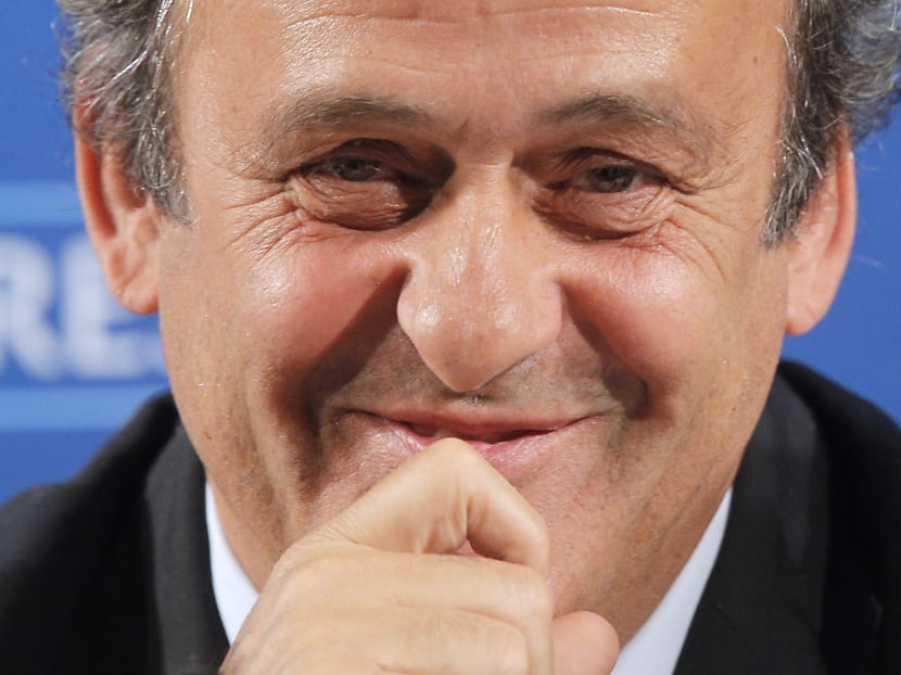 In this Feb 22, 2014 file photo, UEFA President Michel Platini gestures during a press conference, one day prior to the UEFA EURO 2016 qualifying draw in Nice, southeastern France. Michel Platini will run for FIFA president and plans to announce his intentions this week. Photo: AP