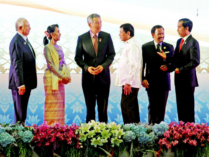 (From left) Malaysian Premier Najib Razak, Myanmar leader Aung San Suu Kyi, Singapore Prime Minister Lee Hsien Loong, Philippines President Rodrigo Duterte, Brunei Sultan Hassanal Bolkiah and Indonesian President Joko Widodo at last September’s Asean Summit. Asean member nations are either part of the South China Sea dispute have been drawn into the geopolitical drama. Photo: Reuters