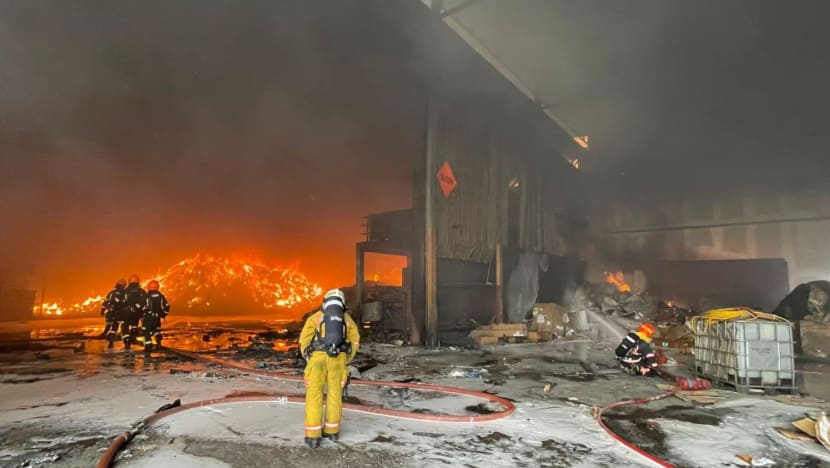 Firefighter injured after blaze involving piles of waste material at Woodlands Industrial Park Firefighter injured after blaze involving piles of waste material at Woodlands Industrial Park