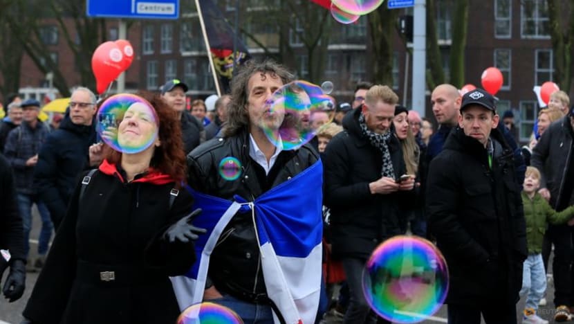 Thousands protest over Dutch coronavirus restrictions Thousands protest over Dutch coronavirus restrictions