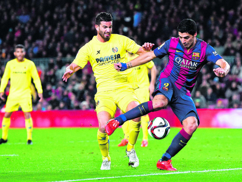 Suarez, at a Copa del Rey match with Villarreal in February, now has a strike rate comparable to Lionel Messi’s. Photo: Getty Images