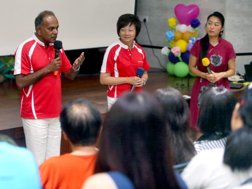 Home Affairs and Law Minister K Shanmugam and Nee Soon GRC MP Lee Bee Wah speaking at a health talk held on International Women’s Day at the Nee Soon South Community Club on March 5, 2017. Photo: Ooi Boon Keong