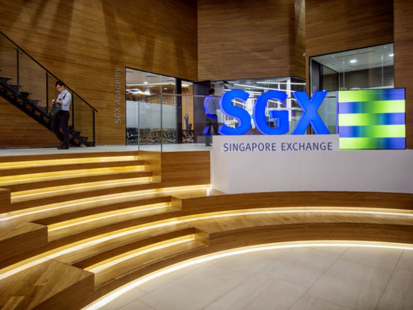 Singapore Exchange Ltd. (SGX) signage is displayed inside the bourse's headquarters in Singapore, on Wednesday, Jan. 21, 2015. SGX posted its first quarterly profit growth in more than a year after a world-beating rally in Chinese stocks spurred demand for derivatives. Photographer: Bryan van der Beek/Bloomberg
