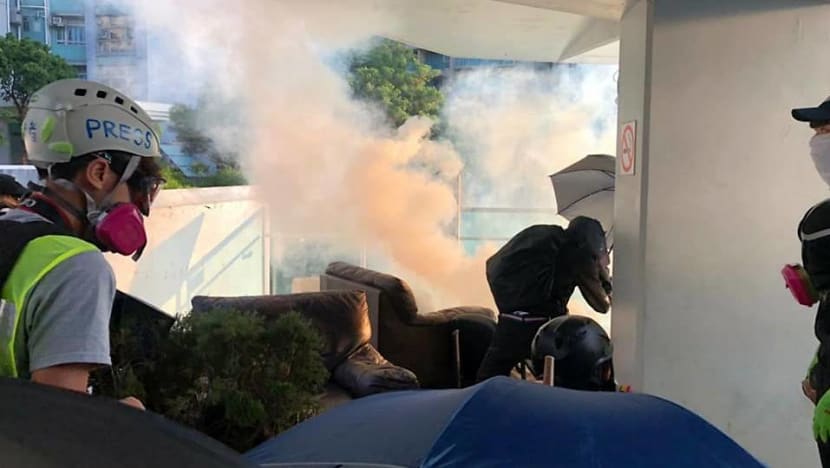 Hong Kong on edge as police fire tear gas at university campus Hong Kong on edge as police fire tear gas at university campus