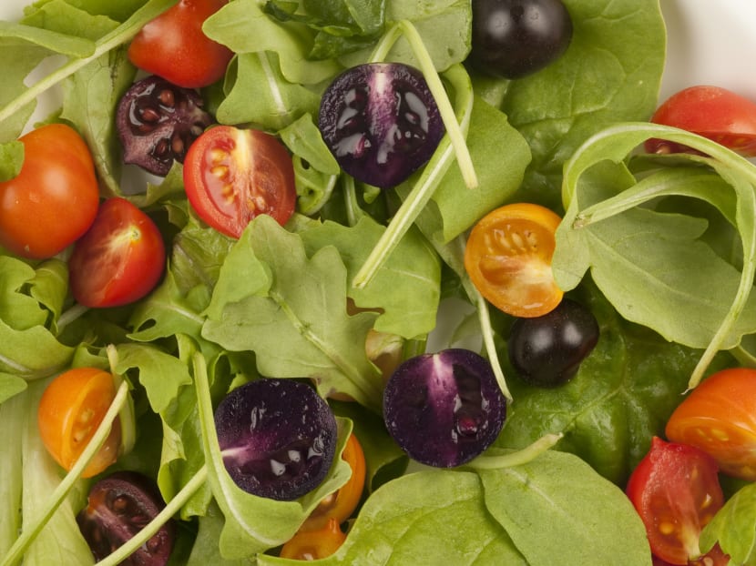 This image provided by The John Innes Centre, UK, shows a salad made with red and purple tomatoes. A small British company is planning to apply for US permission to produce and sell purple tomatoes that have high levels of anthocyanins, compounds found in blueberries that some studies show lower the risk of cardiovascular disease and cancer. Photo: AP