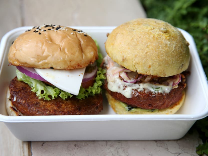 Restaurant mezza9’s Classic Cheese Burger (left) and the Modern Asian Burger with Beyond Burger plant-based patties.