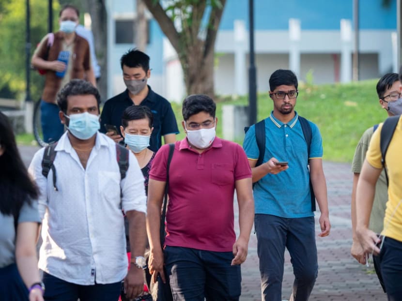 Pedestrians seen in Tampines on March 29, 2022, the first day when people are allowed to choose not to wear masks when outdoors. Pedestrians seen in Tampines on March 29, 2022, the first day when people are allowed to choose not to wear masks when outdoors.