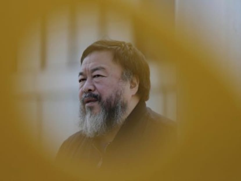 In this March, 2015, file photo, dissident Chinese artist Ai Weiwei speaks during an interview near a playground outside a shopping mall in Beijing. Photo: AP