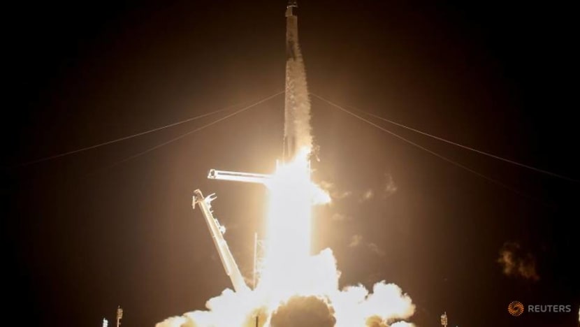 SpaceX capsule, carrying four astronauts, docks with International Space Station SpaceX capsule, carrying four astronauts, docks with International Space Station