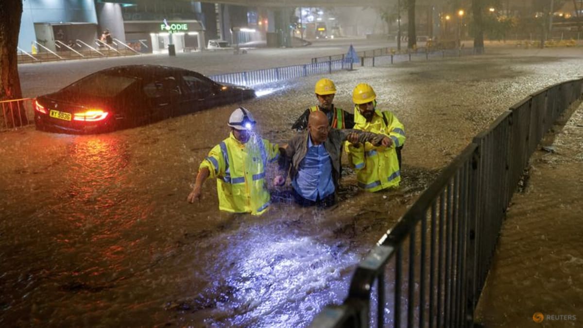 Record rainfall floods Hong Kong’s streets and train stations; all schools shut