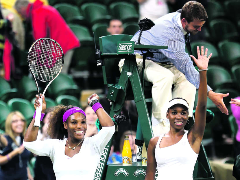 Serena (left) and Venus Williams at the 2012 Wimbledon Grand Slam. Photo: Getty Images file photo