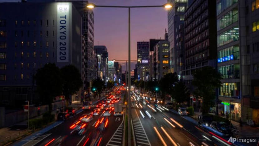 Japan pandemic-hit economy returns to growth in July to September Japan pandemic-hit economy returns to growth in July to September