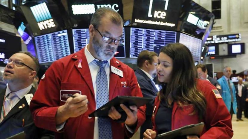 US stocks fall after deluge of mixed earnings