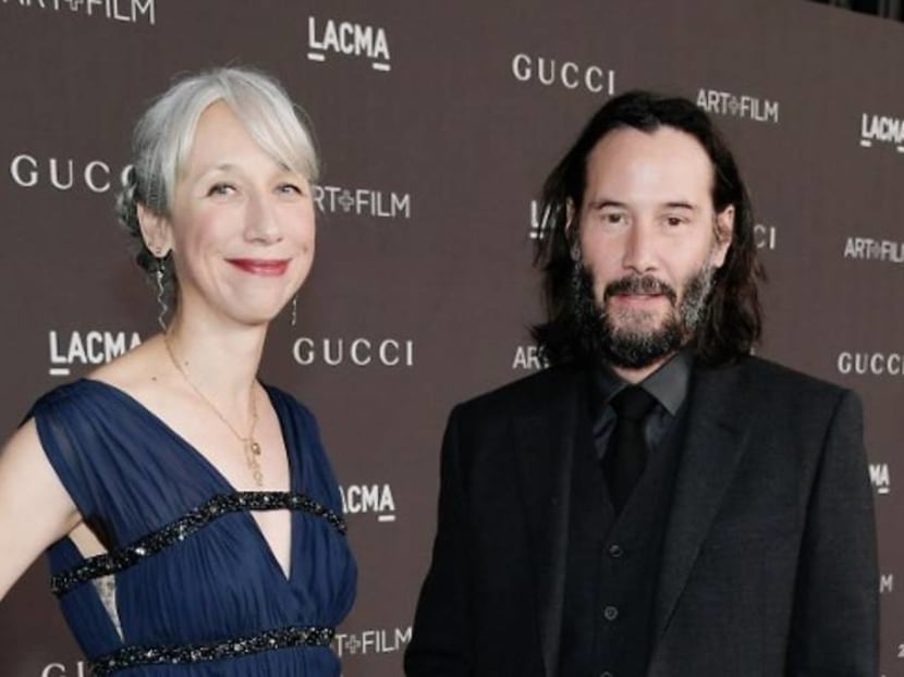 Keanu Reeves sparks girlfriend rumours after holding hands with artist at LA event Keanu Reeves sparks girlfriend rumours after holding hands with artist at LA event