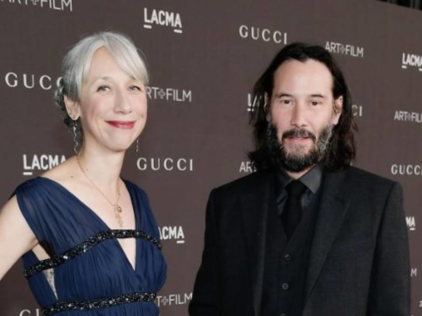 Keanu Reeves sparks girlfriend rumours after holding hands with artist at LA event