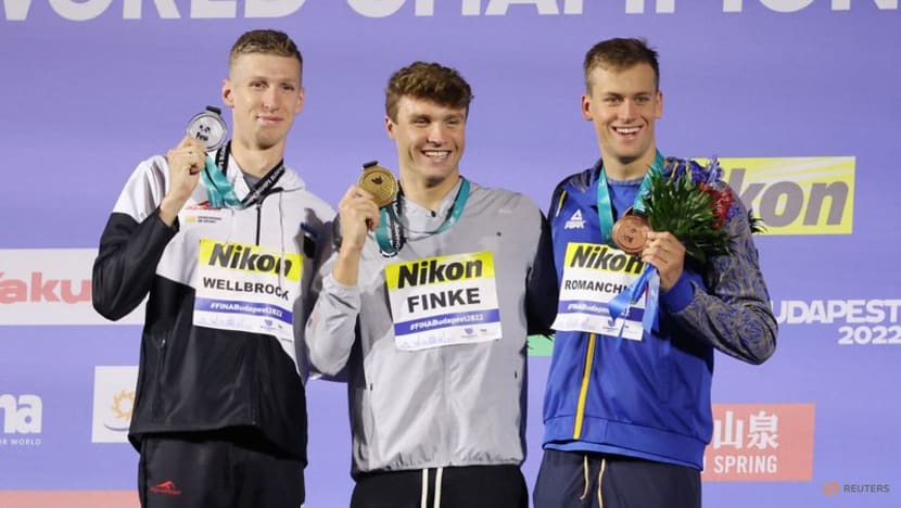 Hungary's Milak smashes own swimming world record, triple gold for US Hungary's Milak smashes own swimming world record, triple gold for US