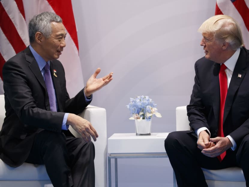 PM Lee meeting President Trump on the sidelines of the G20 Summit in July 2017.  One area that both leaders can discuss when they meet in Washington during Mr Lee's visit is e-commerce, say the authors. TODAY file photo.