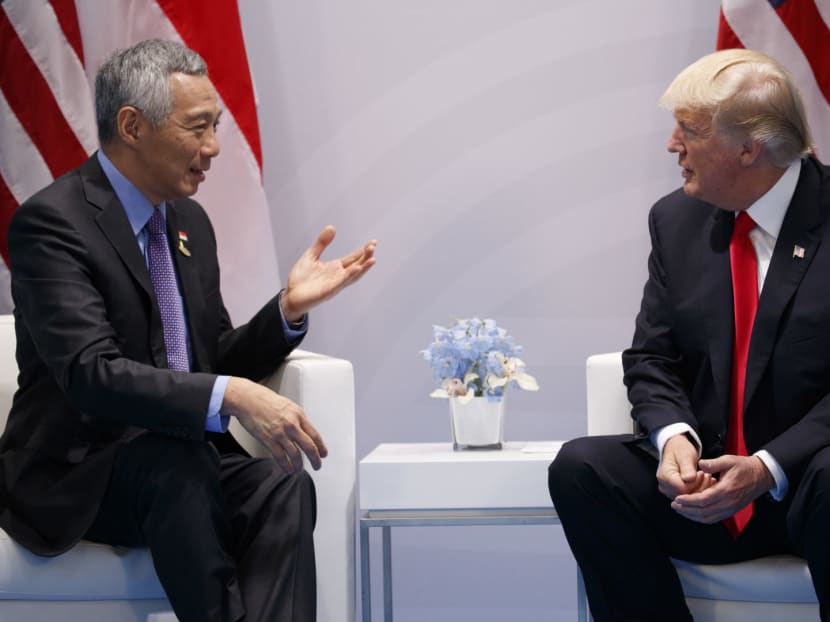 PM Lee meeting President Trump on the sidelines of the G20 Summit in July 2017. One area that both leaders can discuss when they meet in Washington during Mr Lee's visit is e-commerce, say the authors. TODAY file photo. PM Lee meeting President Trump on the sidelines of the G20 Summit in July 2017. One area that both leaders can discuss when they meet in Washington during Mr Lee's visit is e-commerce, say the authors. TODAY file photo.