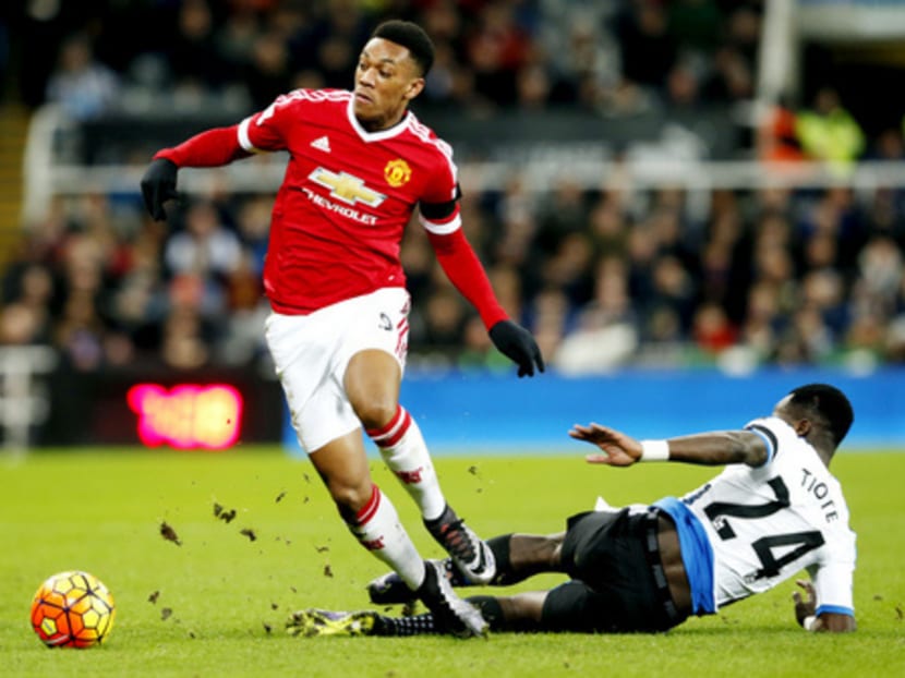 Manchester United’s Anthony Martial is a master of speed, movement and calm, traits he put to good use against Newcastle’s Cheick Tiote. Photo: Reuters