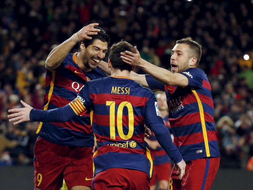 Barcelona's Luis Suarez, Lionel Messi and Jordi Alba celebrate a goal against Celta Vigo. Photo: Reuters