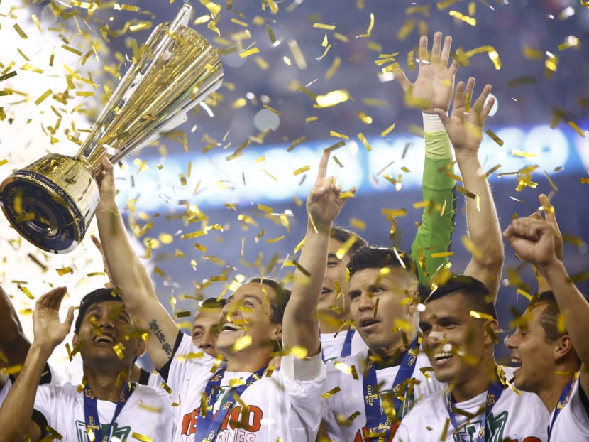 Mexico players celebrate after winning the CONCACAF Gold Cup championship football match against Jamaica, in Philadelphia, on July 26, 2015. Photo: AP