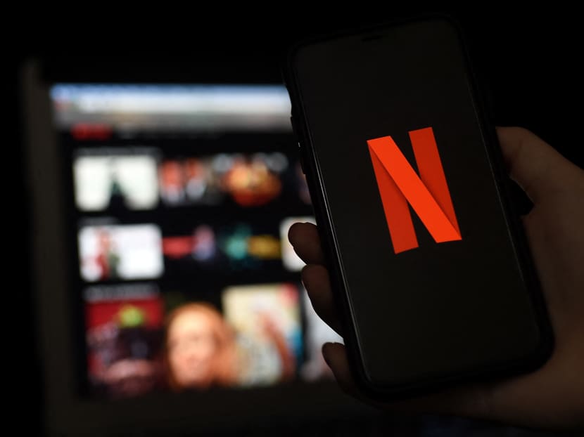 A computer and a mobile phone display the Netflix logo in Arlington, Virginia, US on March 31, 2020.