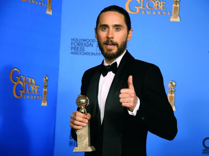 Jared Leto poses backstage with his award for Best Supporting Actor in a Motion Picture for his role in The Dallas Buyers Club at the 71st annual Golden Globe Awards in Beverly Hills. Photo: Reuters