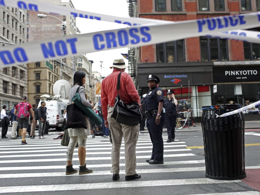 Police guard the area at 23rd Street and Fifth Avenue where an explosion occurred the previous night, in New York, on Sept 18. Photo: The New York Times