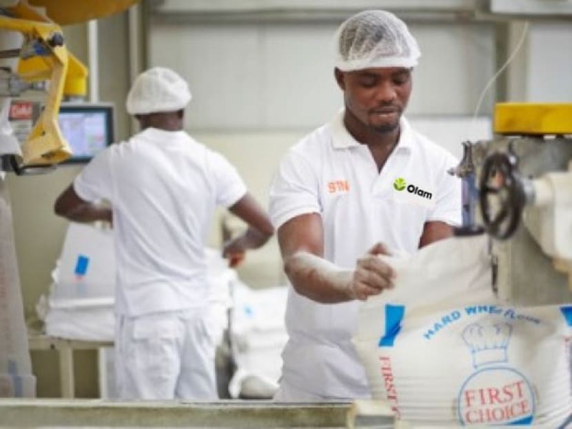 Workers at a wheat milling facility in Nigeria. (Photo: Olam)