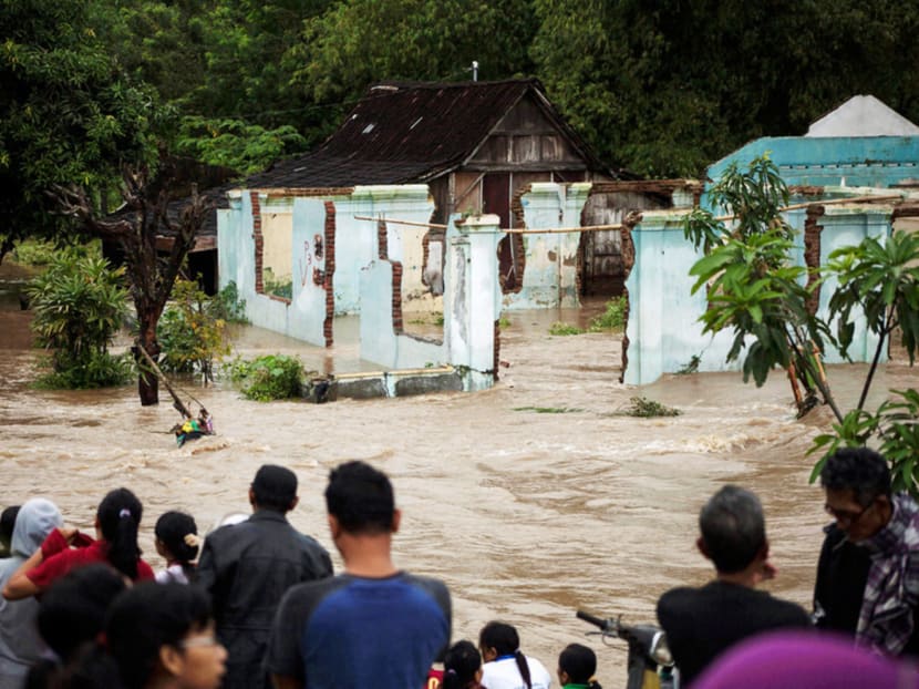Gallery: Indonesian floods, landslides leave 35 dead, 25 missing