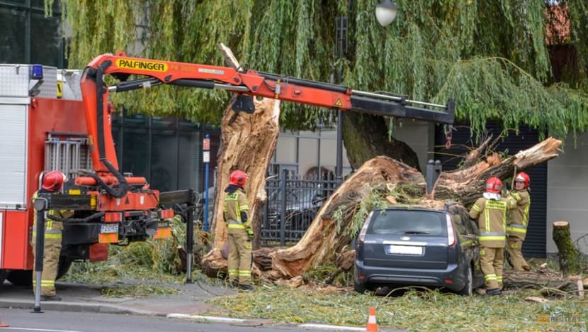 Four dead as hurricane-force winds batter Poland Four dead as hurricane-force winds batter Poland