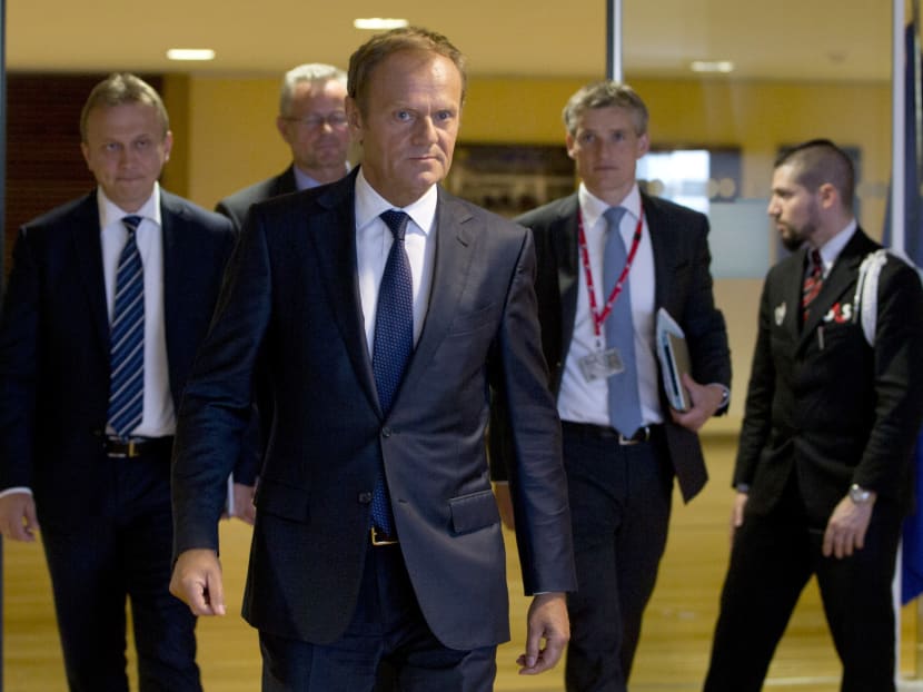 European Council President Donald Tusk, centre, arrives for a meeting at EU headquarters in Brussels on Friday, June 24, 2016. Top European Union officials were hunkering down in Brussels Friday to try to work out what to do next after the shock decision by British voters to leave the 28-nation bloc. Photo: AP