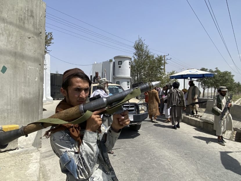 A Taliban fighter holds RPG rocket propelled as he stands guard with others at an entrance gate outside the Interior Ministry in Kabul on Aug 17, 2021. A Taliban fighter holds RPG rocket propelled as he stands guard with others at an entrance gate outside the Interior Ministry in Kabul on Aug 17, 2021.