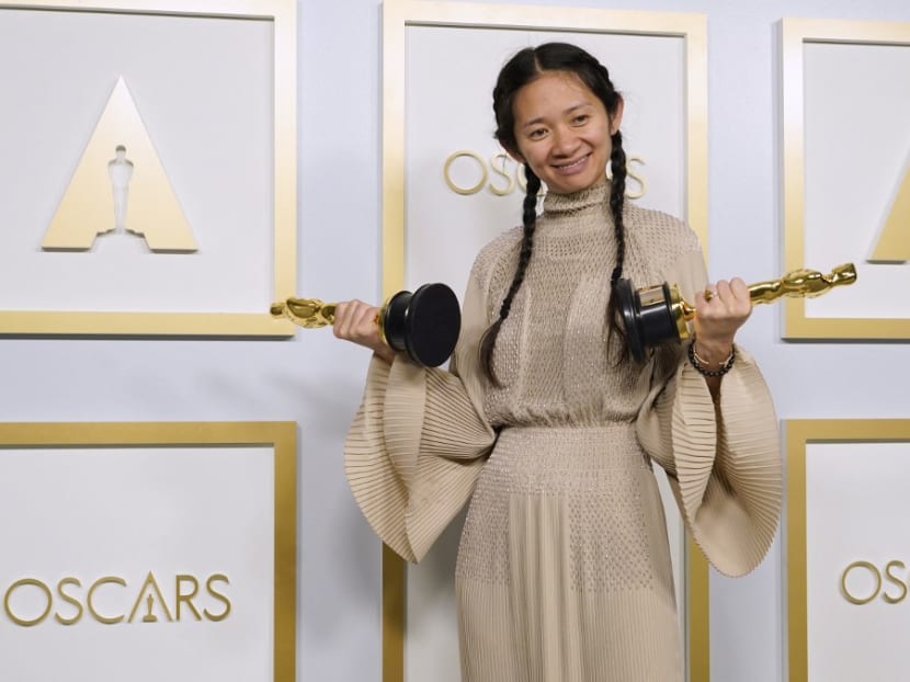 Chinese director and producer Chloe Zhao, winner of the Academy Award for best picture and best director for Nomadland, poses in the press room at the Oscars on April 25, 2021, at Union Station in Los Angeles.