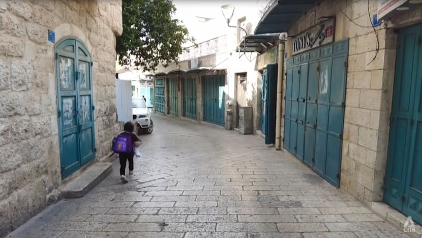 Shuttered shops, empty streets: Gaza conflict severely impacts tourism and economy in the West Bank