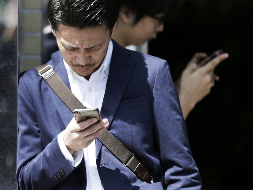 A smartphone user. Photo: Bloomberg