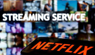 Commentary: Netflix is taking a necessary risk in tackling its 100 million freeloaders