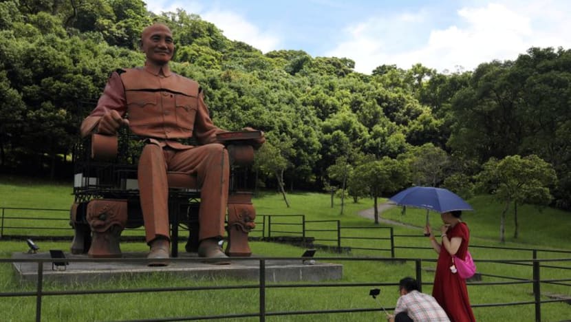 visitors take photos of a statue of chiang kai shek in taoyuan 5 data