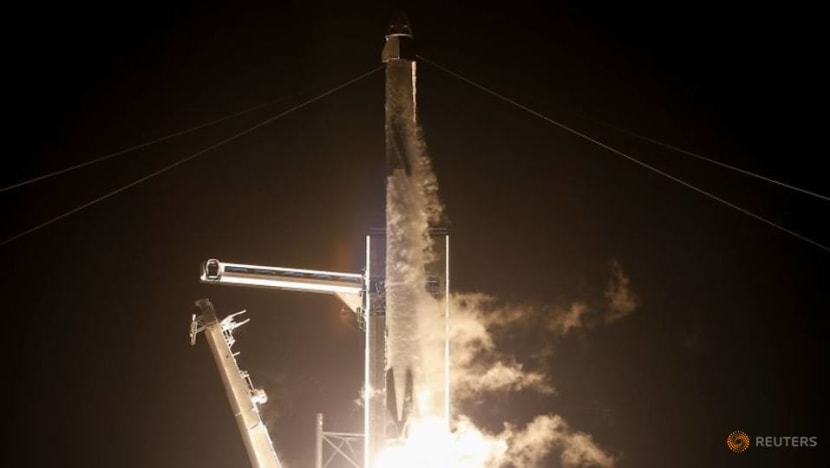 SpaceX capsule, carrying four astronauts, docks with International Space Station SpaceX capsule, carrying four astronauts, docks with International Space Station