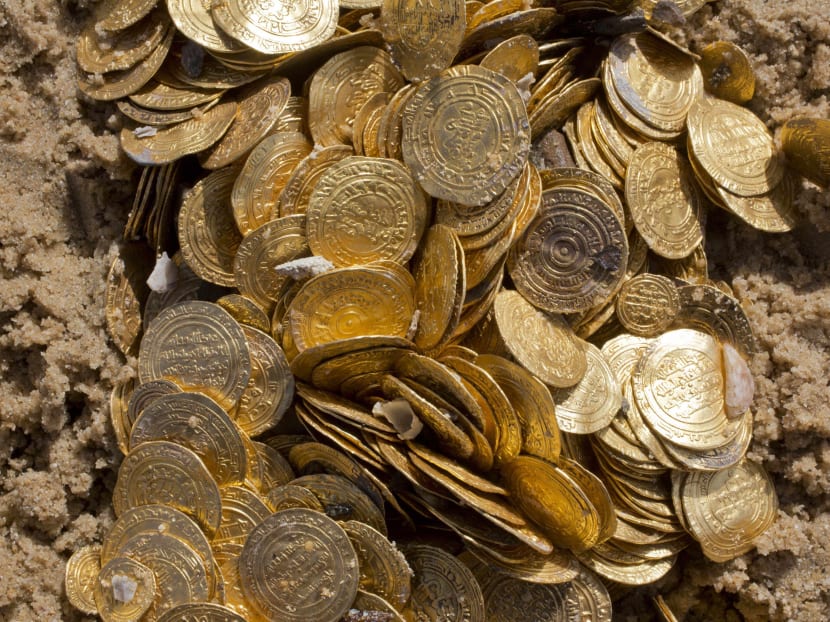 Israel unveils its largest find of medieval gold coins